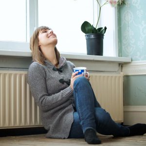 woman enjoying cup of tea